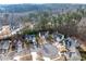 Aerial view of the neighborhood showcasing the beautiful community and surrounding greenery at 1558 Autumn Wood Trl, Sugar Hill, GA 30518