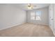 Bedroom with neutral carpet, ceiling fan, and window with blinds at 1558 Autumn Wood Trl, Sugar Hill, GA 30518