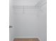 Closet with carpet and wire shelving ready for organizing your wardrobe at 1558 Autumn Wood Trl, Sugar Hill, GA 30518
