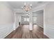 Open-concept dining area showcases hardwood floors, trim, and natural lighting at 1558 Autumn Wood Trl, Sugar Hill, GA 30518