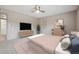 Comfortable bedroom with neutral tones, a ceiling fan, and a spacious layout at 290 Lakemoore Ne Dr # C, Atlanta, GA 30342