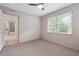 Bright bedroom with new carpet and natural light from large windows, creating a relaxing space at 290 Lakemoore Ne Dr # C, Atlanta, GA 30342