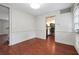 Bright dining room with hardwood floors leads to the kitchen, great for modern living at 290 Lakemoore Ne Dr # C, Atlanta, GA 30342