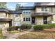 Charming townhome with well-maintained landscaping, walkway, and front door at 290 Lakemoore Ne Dr # C, Atlanta, GA 30342