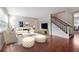 Bright living room showcasing stylish furniture, a modern rug, and sleek hardwood floors at 290 Lakemoore Ne Dr # C, Atlanta, GA 30342