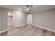 Spacious bedroom with neutral walls, wood flooring, and ample closet space at 3345 Flowers Dr, Atlanta, GA 30337