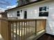 A newly constructed back deck with wooden railings at 1506 Sycamore Nw Dr, Kennesaw, GA 30152