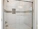 This bathroom features a newly renovated shower with subway tile and modern fixtures at 1506 Sycamore Nw Dr, Kennesaw, GA 30152