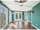 Light-filled dining area with floor to ceiling windows and outdoor access at 172 Shallow Ridge Ne Ln, Kennesaw, GA 30144