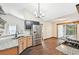 Modern kitchen with stainless steel appliances, granite countertops and a breakfast nook area at 172 Shallow Ridge Ne Ln, Kennesaw, GA 30144