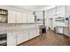 Kitchen featuring granite countertops, stainless steel appliances, and ample cabinet space at 172 Shallow Ridge Ne Ln, Kennesaw, GA 30144