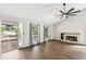 Bright living room with hardwood floors, fireplace, and lots of natural light at 172 Shallow Ridge Ne Ln, Kennesaw, GA 30144