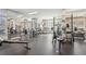 Well-equipped community gym featuring treadmills, weights, and ample workout space at 220 Renaissance Ne Pkwy # 1205, Atlanta, GA 30308