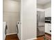 Bright laundry room features a washer and dryer, next to the kitchen at 220 Renaissance Ne Pkwy # 1205, Atlanta, GA 30308