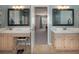 Bathroom featuring a dual vanity sink, tile flooring, and walk-in bathtub at 4260 Laurel Glen Ct, Douglasville, GA 30135