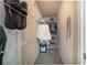 Walk-in closet with shoe rack and hanging clothes at 4260 Laurel Glen Ct, Douglasville, GA 30135