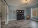 Dining room showcasing a classic hutch, barn door and natural light at 4260 Laurel Glen Ct, Douglasville, GA 30135