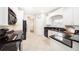 A sleek kitchen features white cabinets and black granite countertops at 4910 Hunters Oaks Ln, Alpharetta, GA 30009