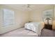 Comfortable bedroom with a bed, neutral walls, and natural light from two windows at 3777 Peachtree Ne Rd # 1007, Atlanta, GA 30319