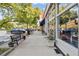 Inviting street view featuring boutique storefronts, well-maintained sidewalks, benches, and decorative planters at 435 Webb Dr, Norcross, GA 30071