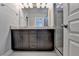 Bathroom with double sink vanity and shower stall at 4498 Dunblane Ave, Sugar Hill, GA 30518