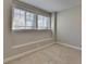Bedroom with carpet and a large window at 4498 Dunblane Ave, Sugar Hill, GA 30518