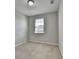 Bright bedroom with carpet, a window and neutral walls, creating a serene and inviting space to relax and unwind at 4498 Dunblane Ave, Sugar Hill, GA 30518