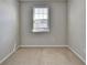 Bright bedroom with carpet, a window and neutral walls, creating a serene and inviting space to relax and unwind at 4498 Dunblane Ave, Sugar Hill, GA 30518