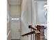 Home entryway with staircase, white walls, and modern decor at 4498 Dunblane Ave, Sugar Hill, GA 30518