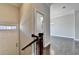 Home entryway with staircase, white walls, and hardwood floors at 4498 Dunblane Ave, Sugar Hill, GA 30518