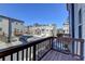 Townhome community featuring private balconies, attached garages, and well-maintained landscaping at 4498 Dunblane Ave, Sugar Hill, GA 30518