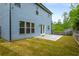 Spacious backyard with a patio area and well-maintained lawn, ideal for outdoor activities at 628 Avondale Hills Dr, Decatur, GA 30032
