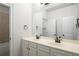 Bathroom featuring dual sinks, a large mirror, and soft lighting, creating a functional and inviting space at 628 Avondale Hills Dr, Decatur, GA 30032
