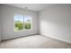Bright bedroom with a large window, offering plenty of natural light and outdoor views at 628 Avondale Hills Dr, Decatur, GA 30032