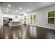 Spacious kitchen with island, stainless steel appliances, and dark hardwood floors at 628 Avondale Hills Dr, Decatur, GA 30032