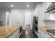 Gourmet kitchen with an island, gas range, and granite countertops at 628 Avondale Hills Dr, Decatur, GA 30032