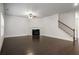 Bright and open living room with a fireplace and hardwood floors at 628 Avondale Hills Dr, Decatur, GA 30032