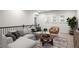 Relaxing upstairs living area featuring a plush sectional sofa, stylish decor, and plenty of natural light at 628 Avondale Hills Dr, Decatur, GA 30032