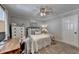 Comfortable bedroom includes a ceiling fan, carpeting, and a closet at 136 Peachtree Memorial Nw Dr # Ct3, Atlanta, GA 30309