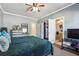 Cozy bedroom with closet, bathroom, and a view at 1369 Sierra Ridge Pl, Loganville, GA 30052