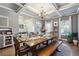 Formal dining room showcasing an elegant table setting and natural light at 1369 Sierra Ridge Pl, Loganville, GA 30052