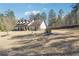 Charming property with a well-manicured lawn and inviting curb appeal at 1369 Sierra Ridge Pl, Loganville, GA 30052
