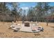 Charming backyard firepit with string lights at 1369 Sierra Ridge Pl, Loganville, GA 30052
