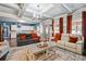 Open living space with a view of the kitchen and a cozy seating arrangement at 1369 Sierra Ridge Pl, Loganville, GA 30052