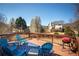 Relax on this back deck with views of mature trees, seating, and a grill, perfect for entertaining at 2520 Cross Springs Dr, Cumming, GA 30041