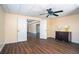 Basement room with hardwood floors, neutral paint, and double doors leading to another space at 2520 Cross Springs Dr, Cumming, GA 30041