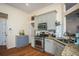 Well-lit kitchen with stainless steel appliances, granite countertops, and hardwood floors at 2520 Cross Springs Dr, Cumming, GA 30041