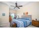 Comfortable main bedroom with a ceiling fan, neutral walls, and carpeted floors at 2520 Cross Springs Dr, Cumming, GA 30041