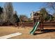 Backyard playground area featuring a swing set and slide for entertainment at 2520 Cross Springs Dr, Cumming, GA 30041