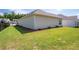 Well-maintained backyard featuring a lush lawn, privacy fencing, and mature trees at 4902 Pleasantry Way, Acworth, GA 30101